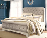 Realyn King Upholstered Sleigh Bed, Dresser, Mirror and 2 Nightstands
