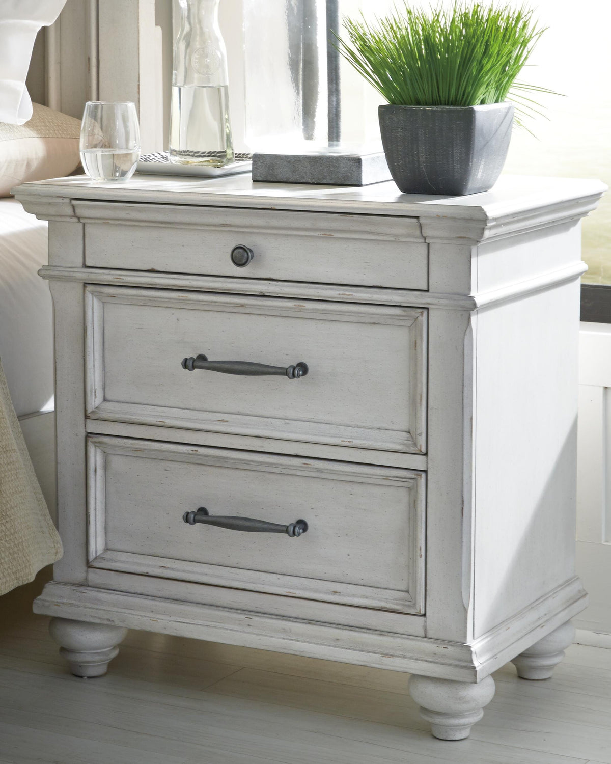 Kanwyn Queen Upholstered Panel Bed, Dresser, and Nightstand