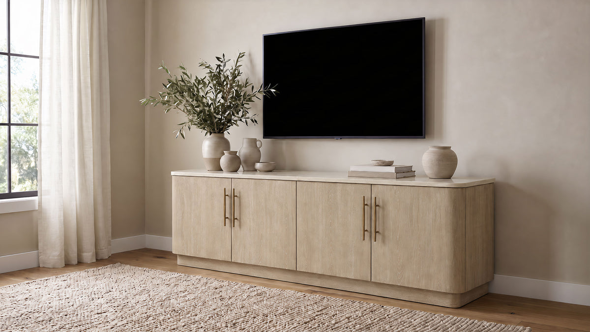 Lucaire 4-Door TV Stand for TVs up to 77 Inches Honed Cream and Sandstone — room setting