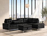 Anserra Black Reversible Sectional with Ottoman | Olivia Furniture